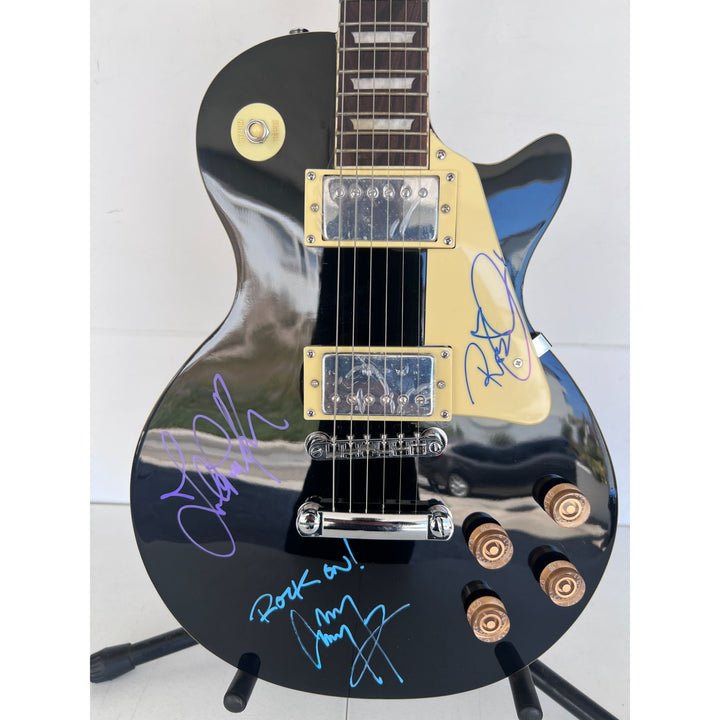 Jimmy Page Robert Plant John Paul Jones Led Zeppelin vintage les paul full size electric guitar signed with proof.
