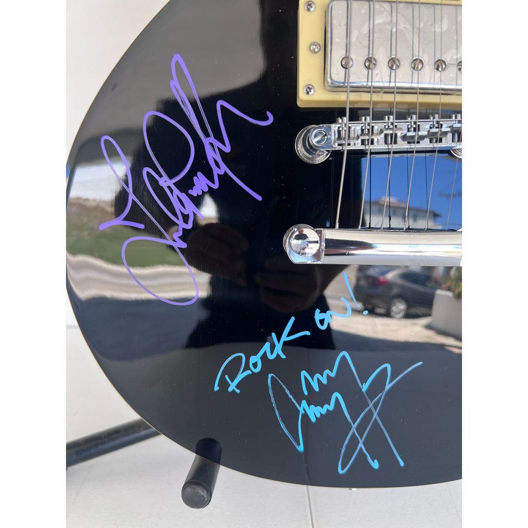 Jimmy Page Robert Plant John Paul Jones Led Zeppelin vintage les paul full size electric guitar signed with proof.