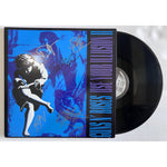 Load image into Gallery viewer, Guns n Roses, W. Axl Rose, Slash, Izzy Stradlin Use your Illusion II album signed with proof
