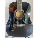 Load image into Gallery viewer, Barry, Robin and Maurice Gibb the Bee Gees  39&#39; acoustic guitar signed with proof
