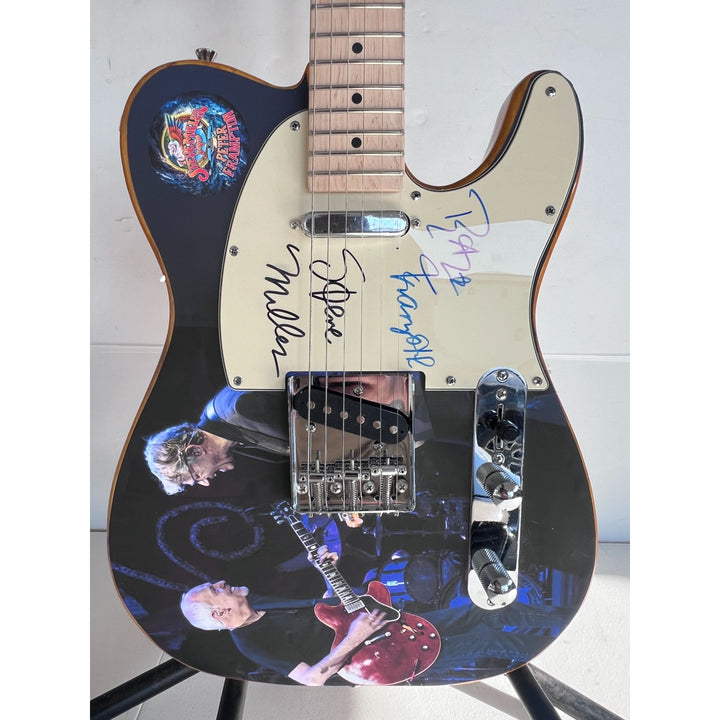 Peter Frampton and Steve Miller telecaster electric guitar signed with proof.