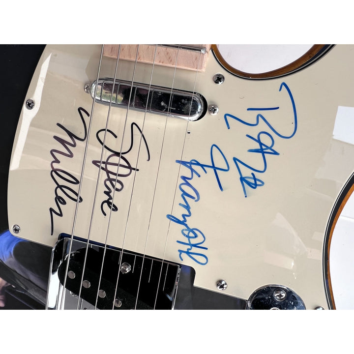 Peter Frampton and Steve Miller telecaster electric guitar signed with proof.