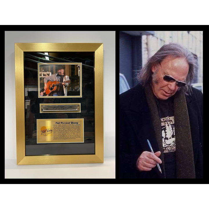 Neil Young framed harmonica signed with proof