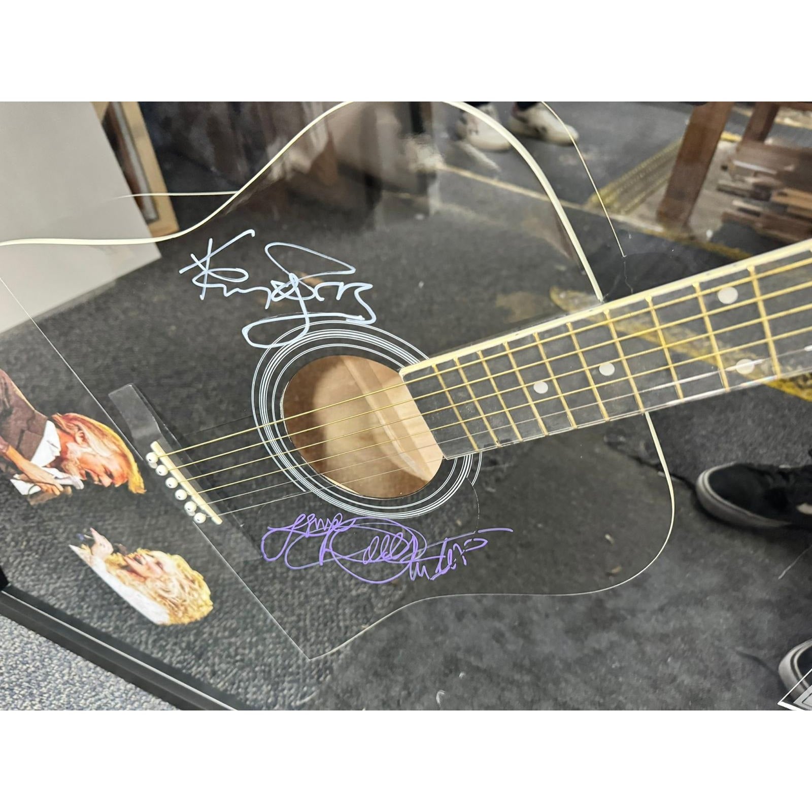 Dolly Parton and Kenny Rogers full size acoustic guitar signed and framed with proof