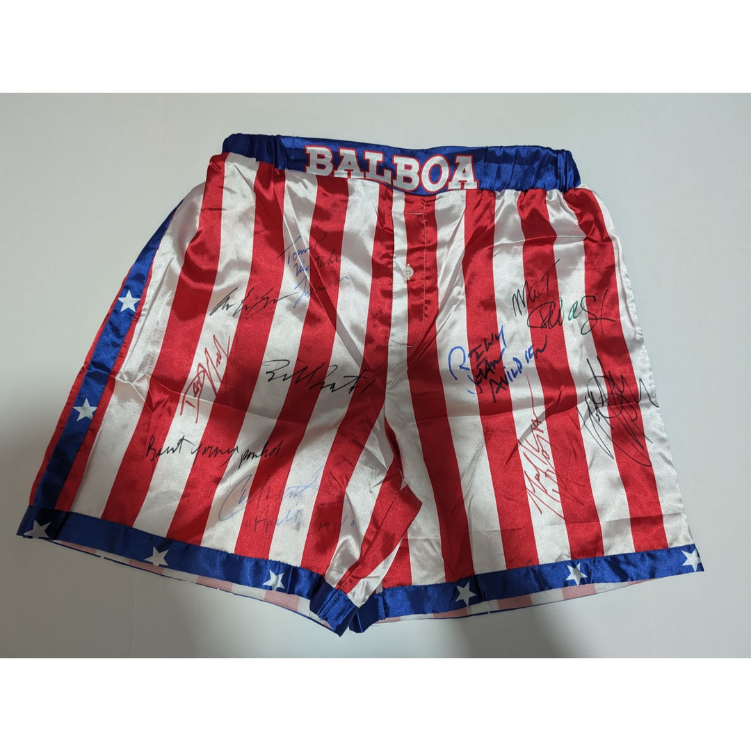 Rocky Balboa USA boxing shorts signed by the cast of Rocky including Sylvester Stallone Carl Weathers talliest shire Mr T Bert Young dolls l