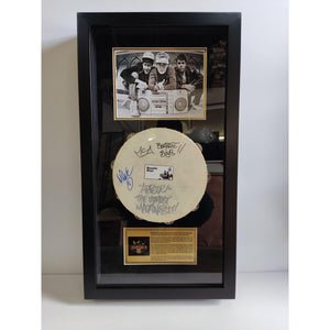 The Beastie Boys, 'Mike D' Diamond, Adam 'MCA' Yauch, Adam 'Ad-Rock' Horovitz tambourine signed & framed with proof