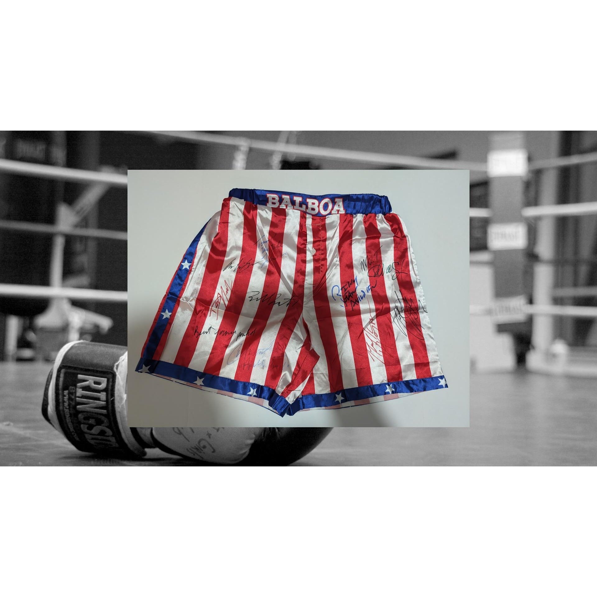 Rocky Balboa USA boxing shorts signed by the cast of Rocky including Sylvester Stallone Carl Weathers talliest shire Mr T Bert Young dolls l