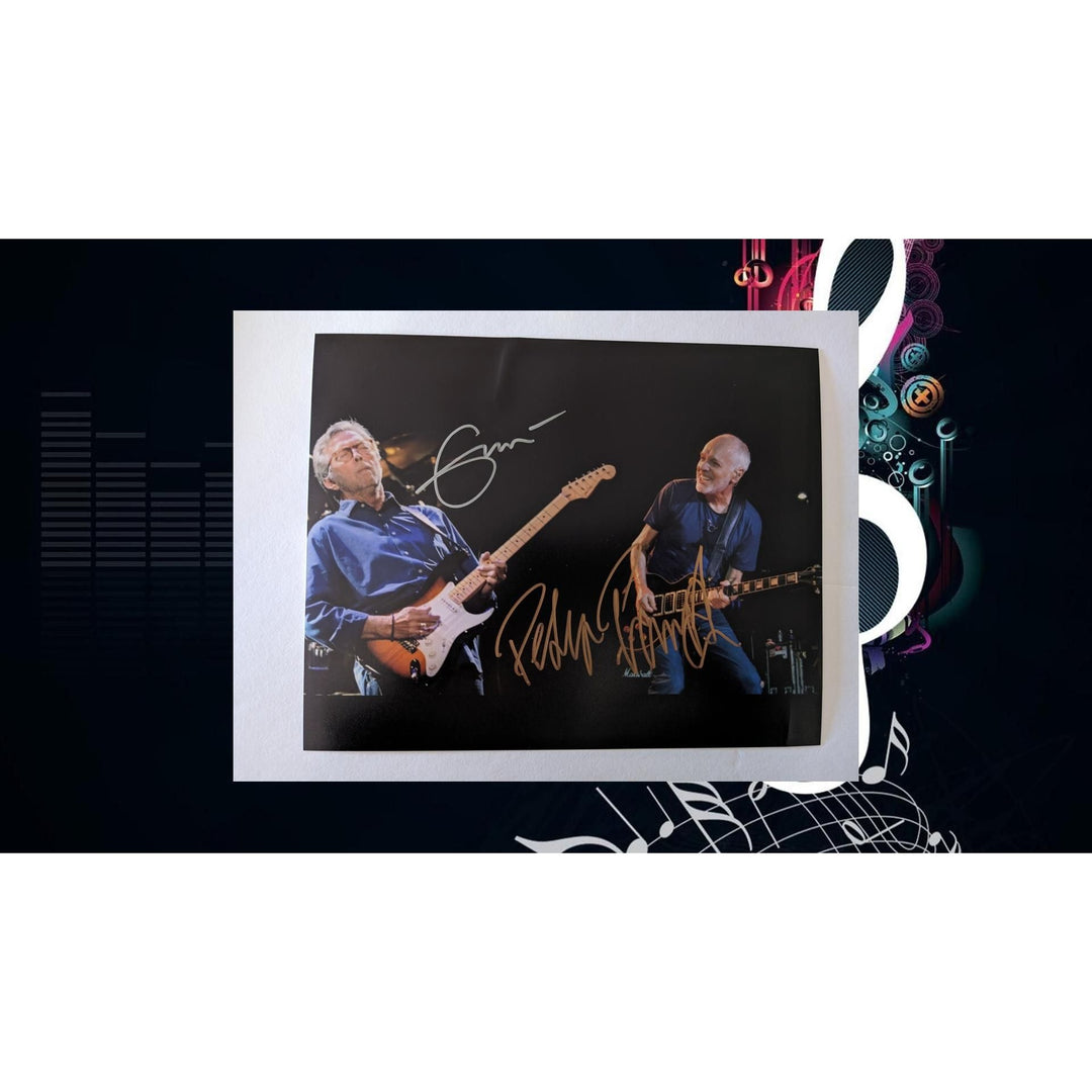 Eric Clapton and Peter Frampton eight by ten photo signed with proof