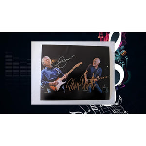 Eric Clapton and Peter Frampton eight by ten photo signed with proof