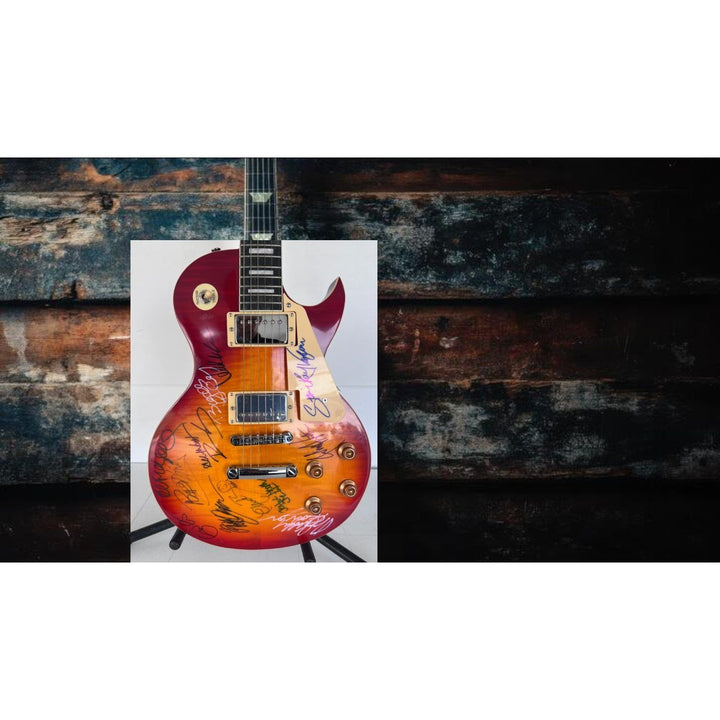 Stevie Ray Vaughan, Chuck Berry, Eric Clapton  BB King vintage les paul full size electric guitar signed with proof.