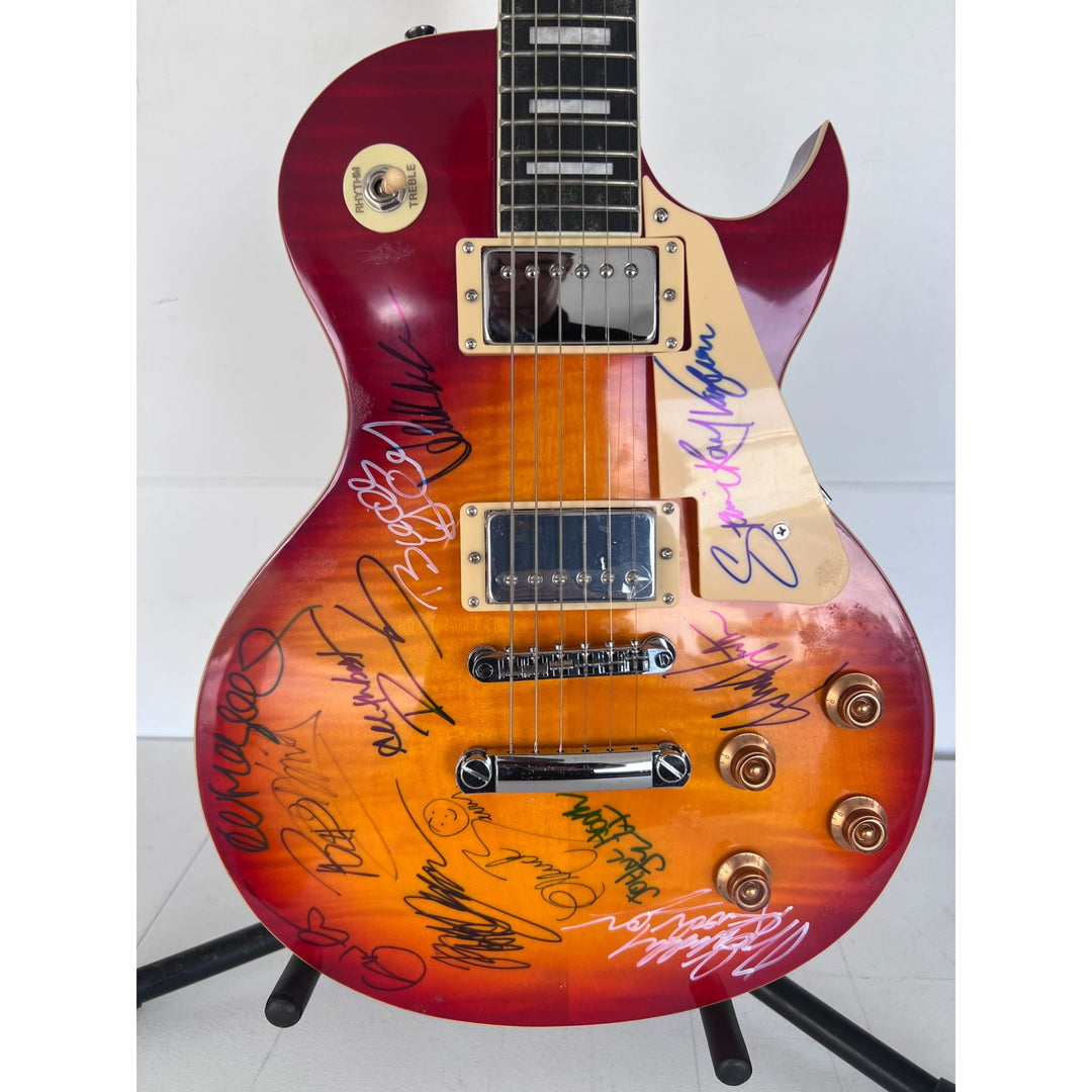 Stevie Ray Vaughan, Chuck Berry, Eric Clapton  BB King vintage les paul full size electric guitar signed with proof.