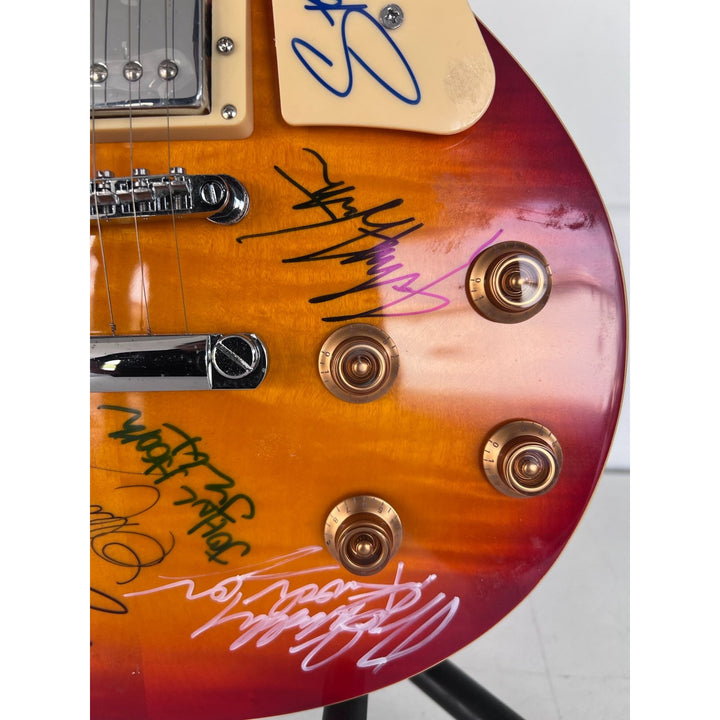 Stevie Ray Vaughan, Chuck Berry, Eric Clapton  BB King vintage les paul full size electric guitar signed with proof.