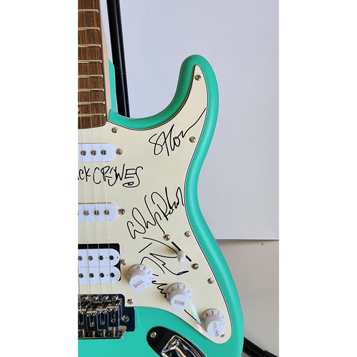 The Black Crowes Chris Rich Robinson, Steve Gorman Fender Stratocaster electric guitar signed with proof