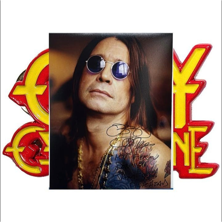 Ozzy Osbourne 11x14 photo signed with proof.