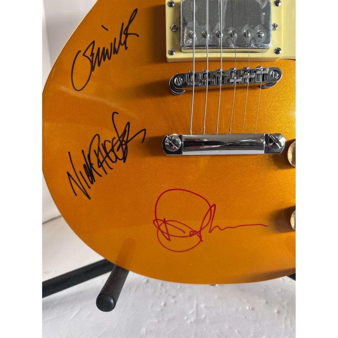 Duran Duran Simon Le Bon, John Taylor, Nick Rhodes Roger Taylor and Andy Taylor les paul electric guitar signed whit proff