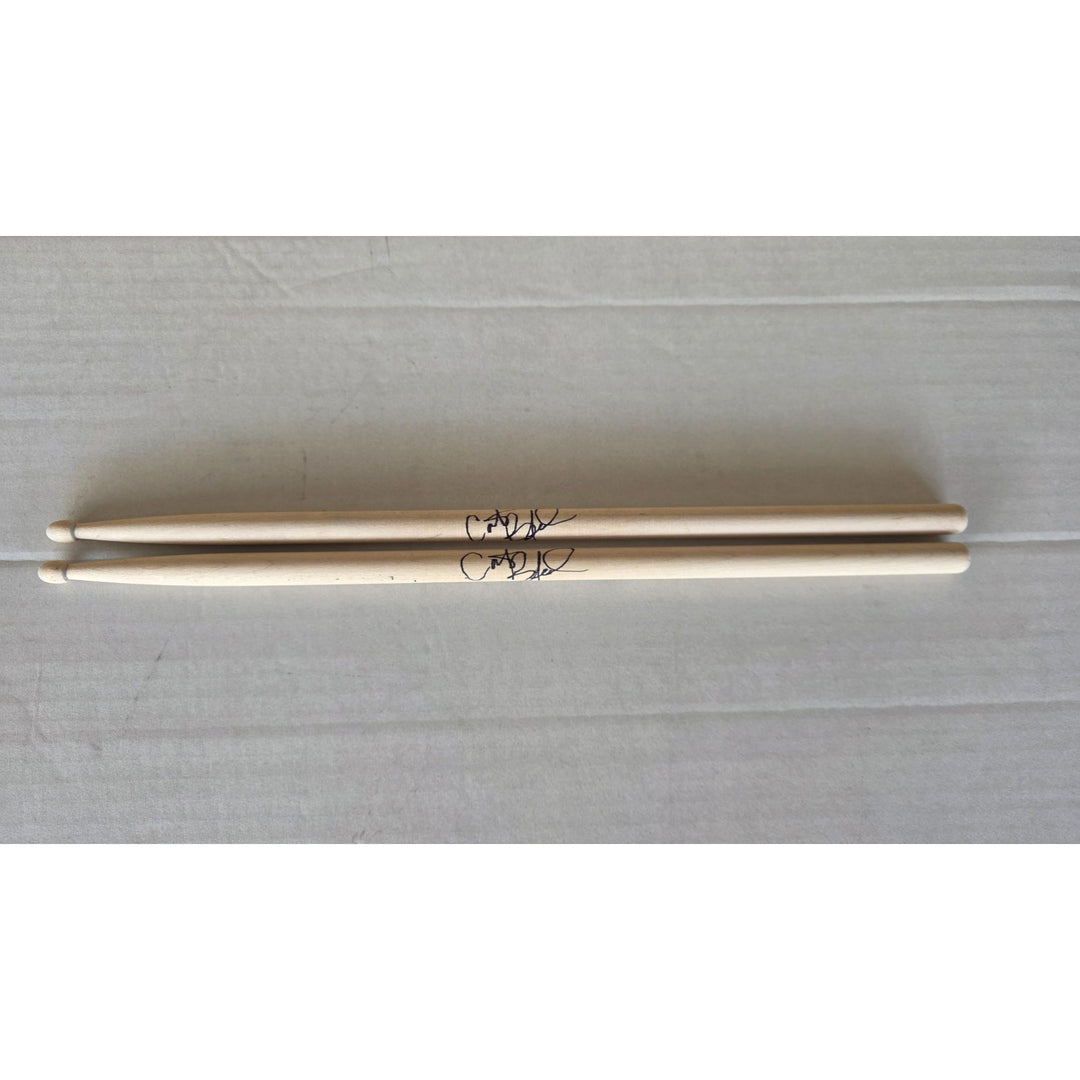 Carter Beauford drummer of the Dave Matthews Band drumsticks (2) signed with proof.