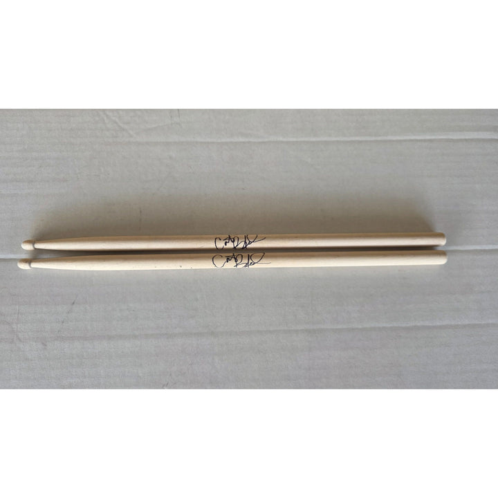 Carter Beauford drummer of the Dave Matthews Band drumsticks (2) signed with proof.