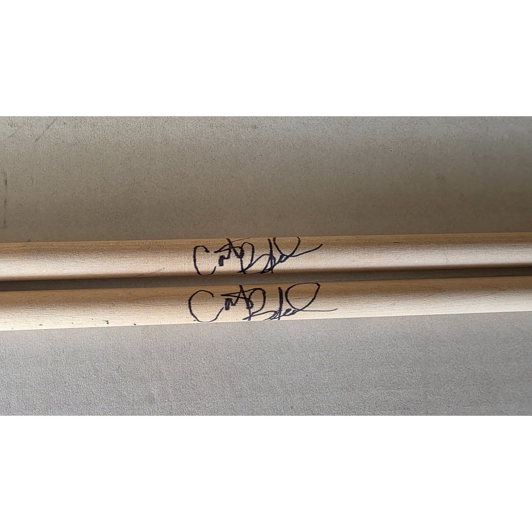 Carter Beauford drummer of the Dave Matthews Band drumsticks (2) signed with proof.