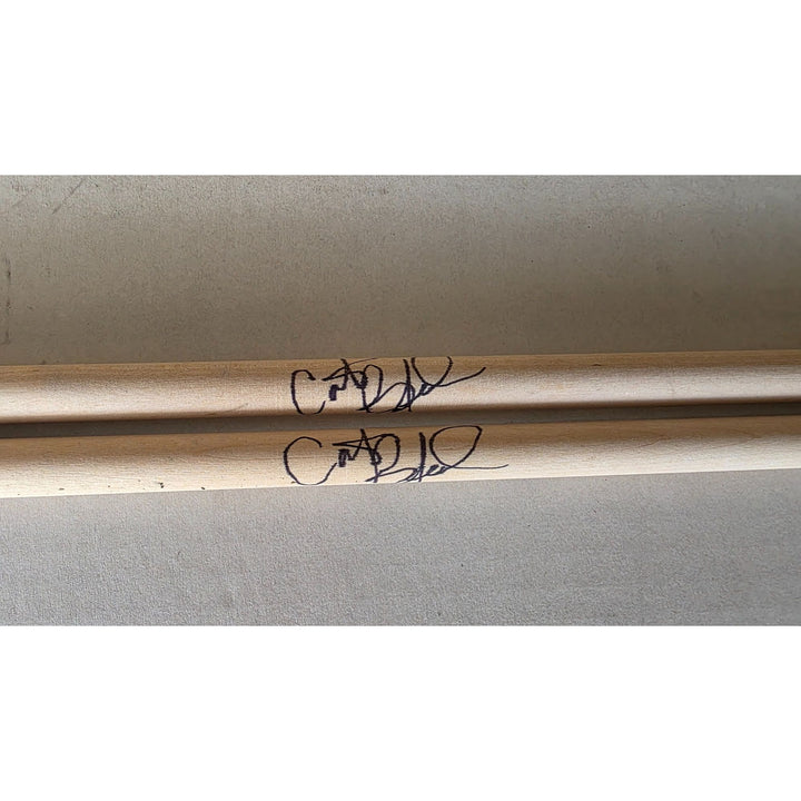 Carter Beauford drummer of the Dave Matthews Band drumsticks (2) signed with proof.