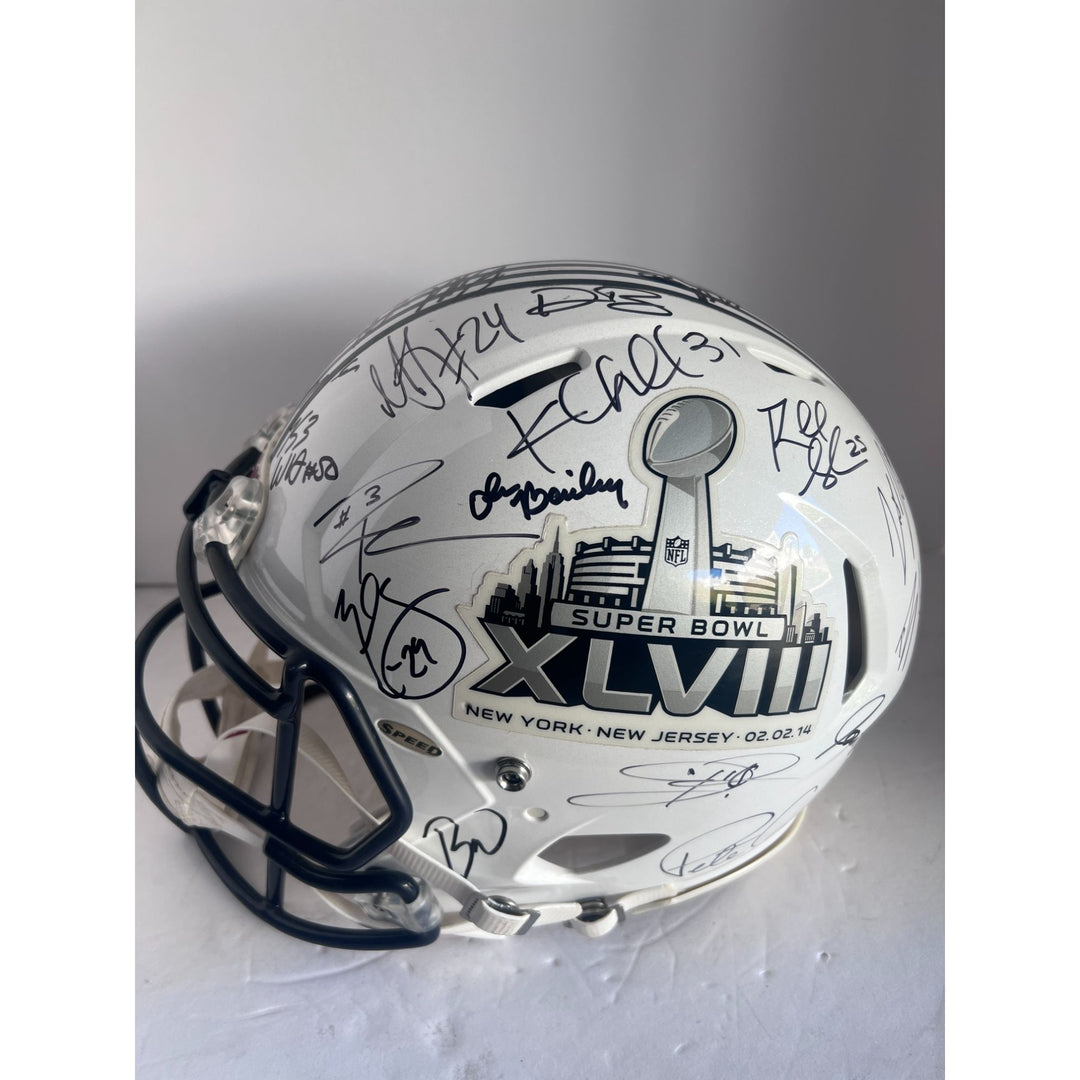 Seattle Seahawks 2013-14 Super Bowl champions commemorative Riddell helmet team signed Russell Wilson Pete Carroll Richard Sherman