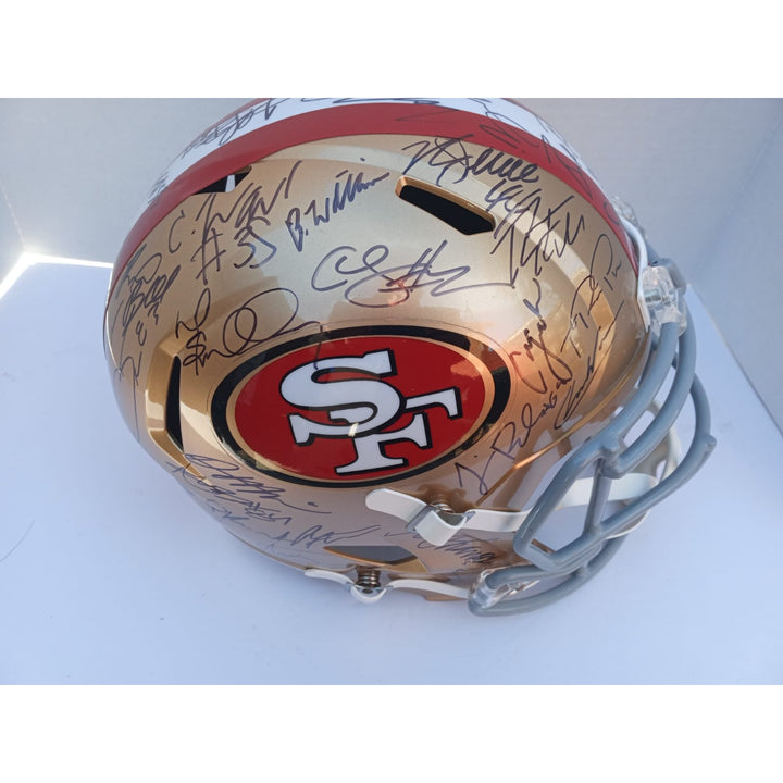 San Francisco 49ers Christian McCaffrey George Kittle Deebo Samuel Brock Purdy 2023 Riddell speed full size helmet signed with proof and fre