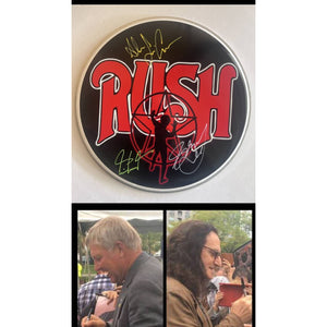 Rush Geddy Lee, Neil Peart, Alex Lifeson one-of-a-kind drumhead signed with proof
