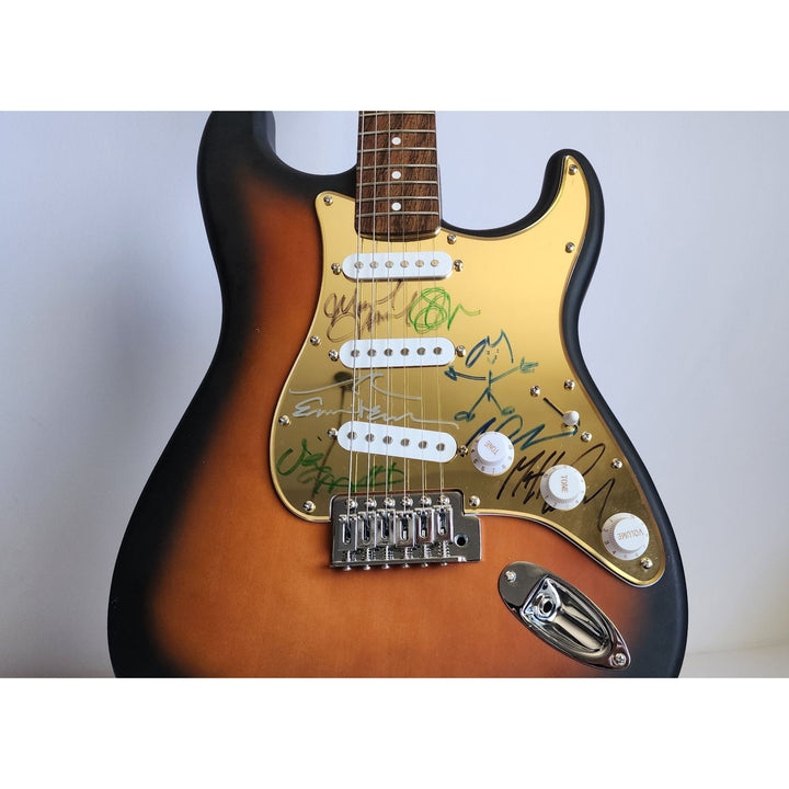 Pearl Jam Eddie Vedder, Matt McCready, Matt Cameron, Stone Gossard, Jeff Amen Fender Stratocaster Squier electric guitar signed with proof