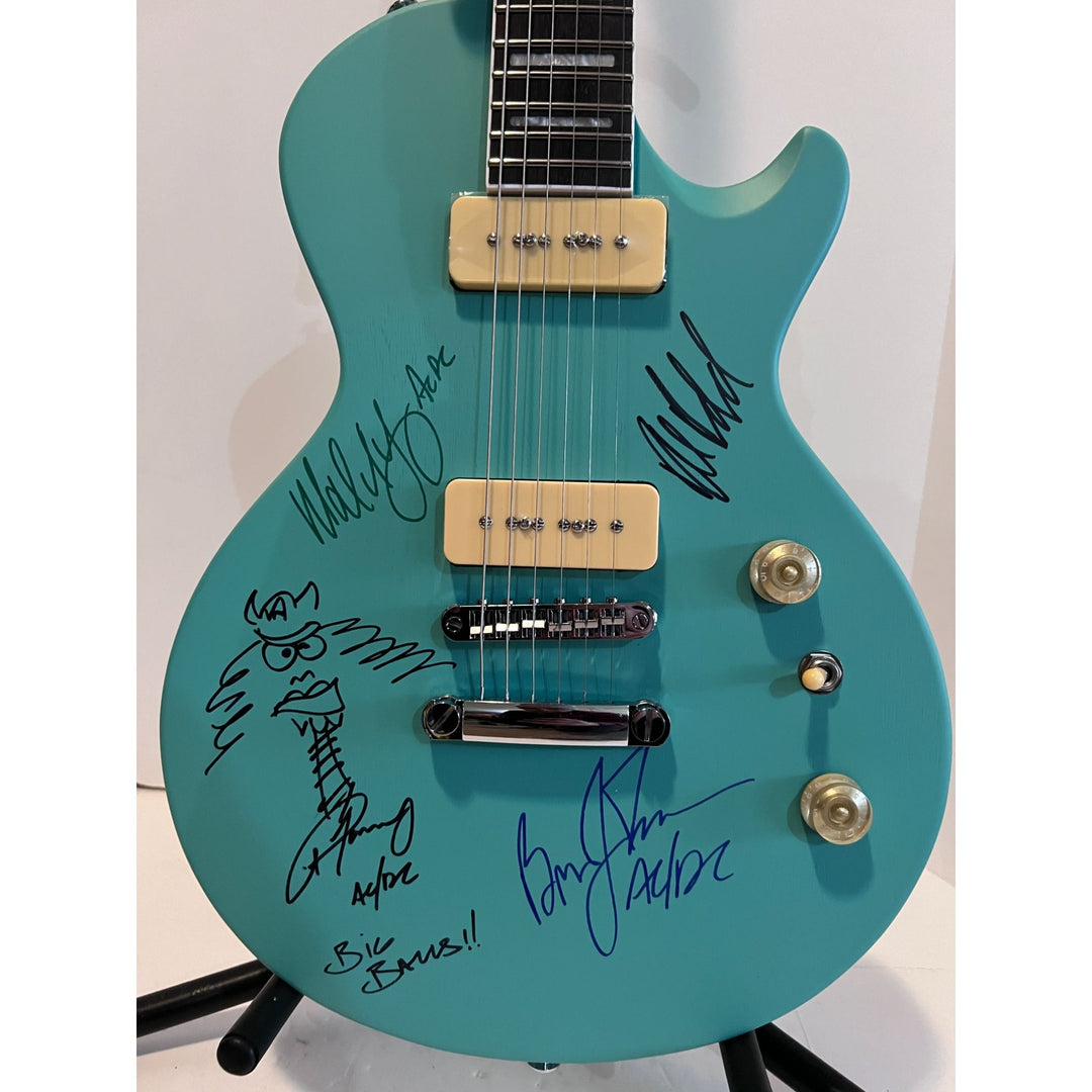 AC/DC Angus Young Brian Johnson Malcolm Young Phil Rudd Les Paul electric guitars signed with proof