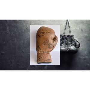 Heavyweight Champions Muhammed Ali Tyson Fury Mike Tyson George Foreman vintage boxing glove signed with proof