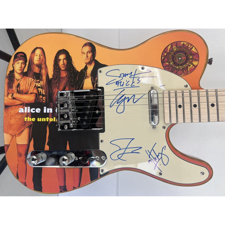Alice in Chains Layne Staley, Jerry Cantrell, Mike Starr, and Sean Kinney telecaster electric guitar signed with proof..