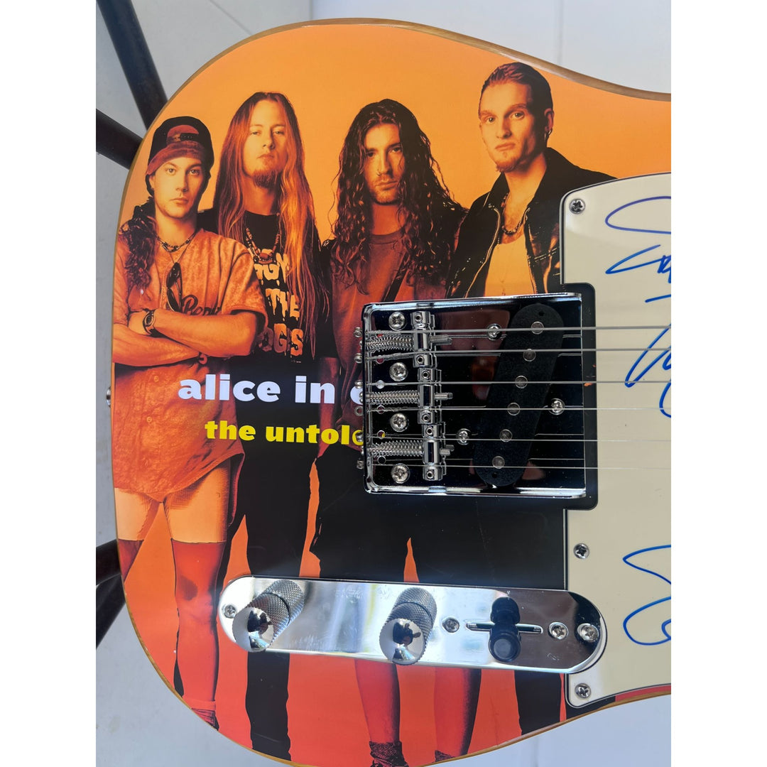 Alice in Chains Layne Staley, Jerry Cantrell, Mike Starr, and Sean Kinney telecaster electric guitar signed with proof..