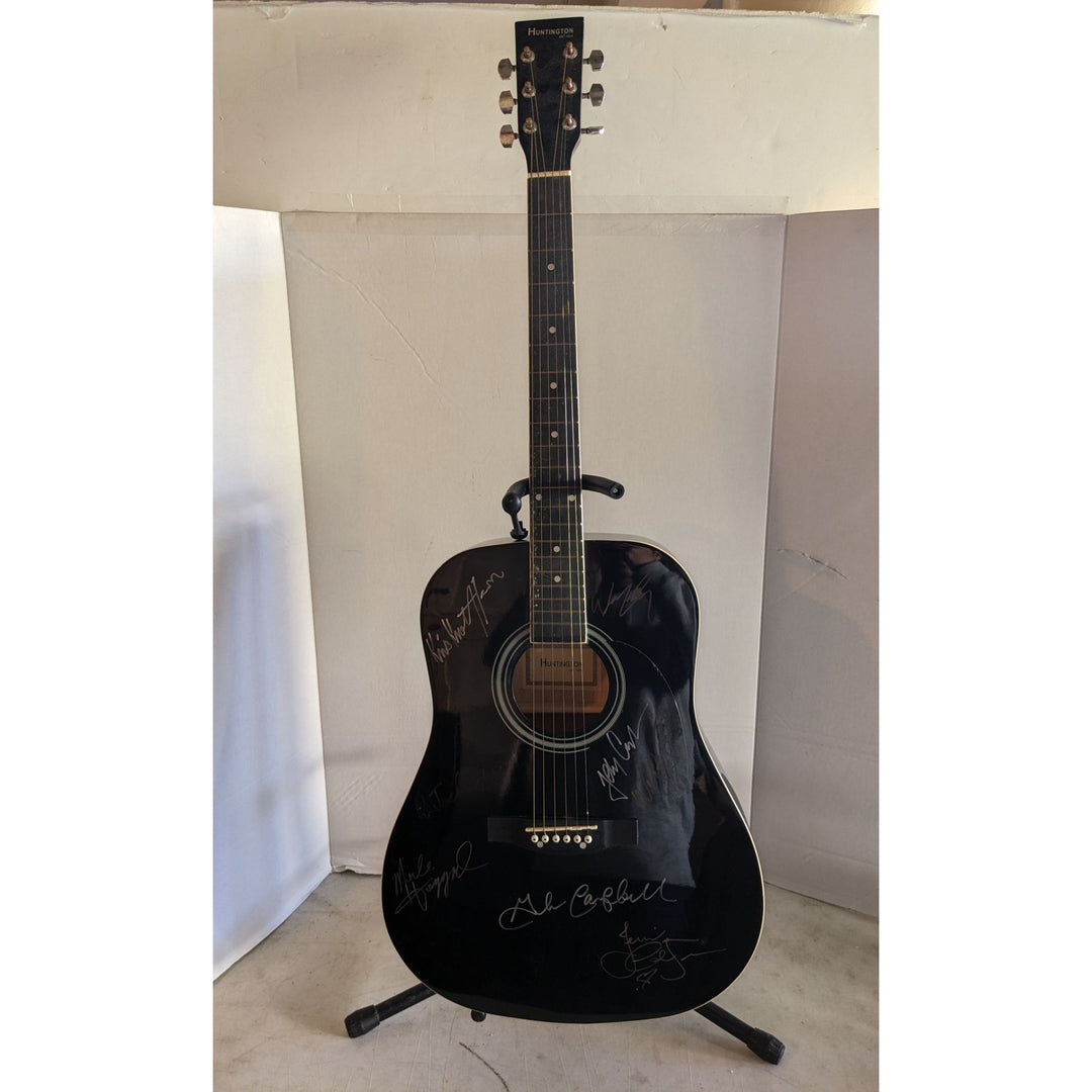The Highwaymen Johnny Cash, Waylon Jennings, Willie Nelson and Kris Kristofferson full size acoustic guitar signed with proof