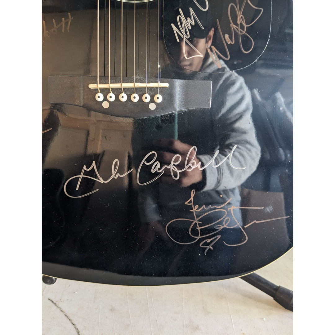 The Highwaymen Johnny Cash, Waylon Jennings, Willie Nelson and Kris Kristofferson full size acoustic guitar signed with proof