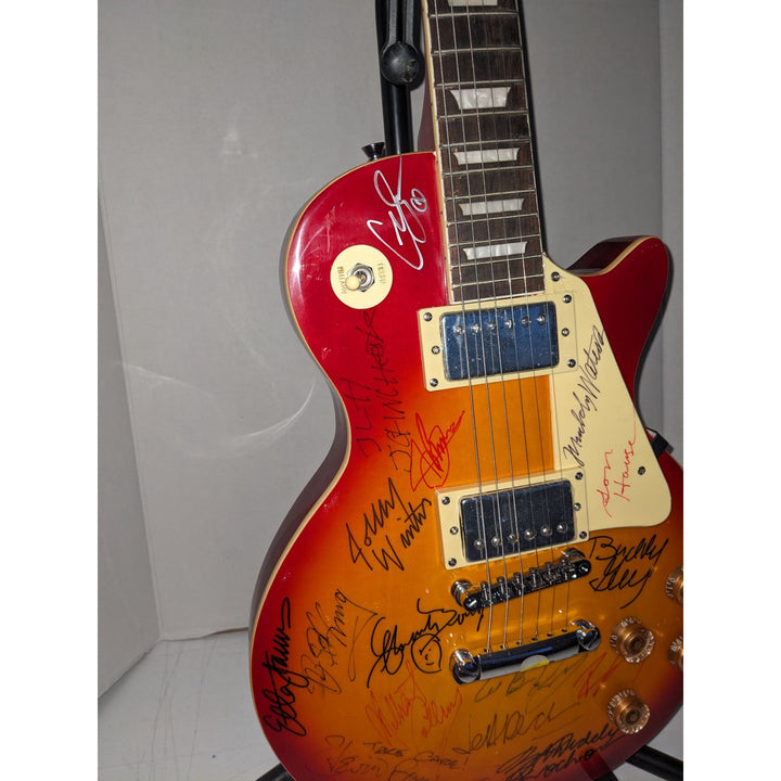 Blues legends Stevie Ray Vaughan, BB King, Chuck Berry, Muddy Watters, Jeff Beck les paul (cherry) electric guitar signed with proof