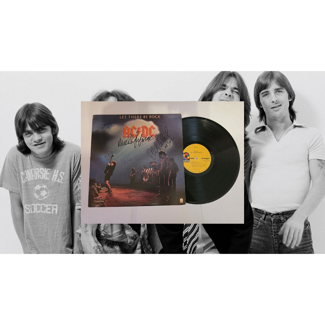 Angus young Malcolm Young Brian Johnson Cliff Williams Phil Rudd AC DC Let there be rock lp signed with proof.