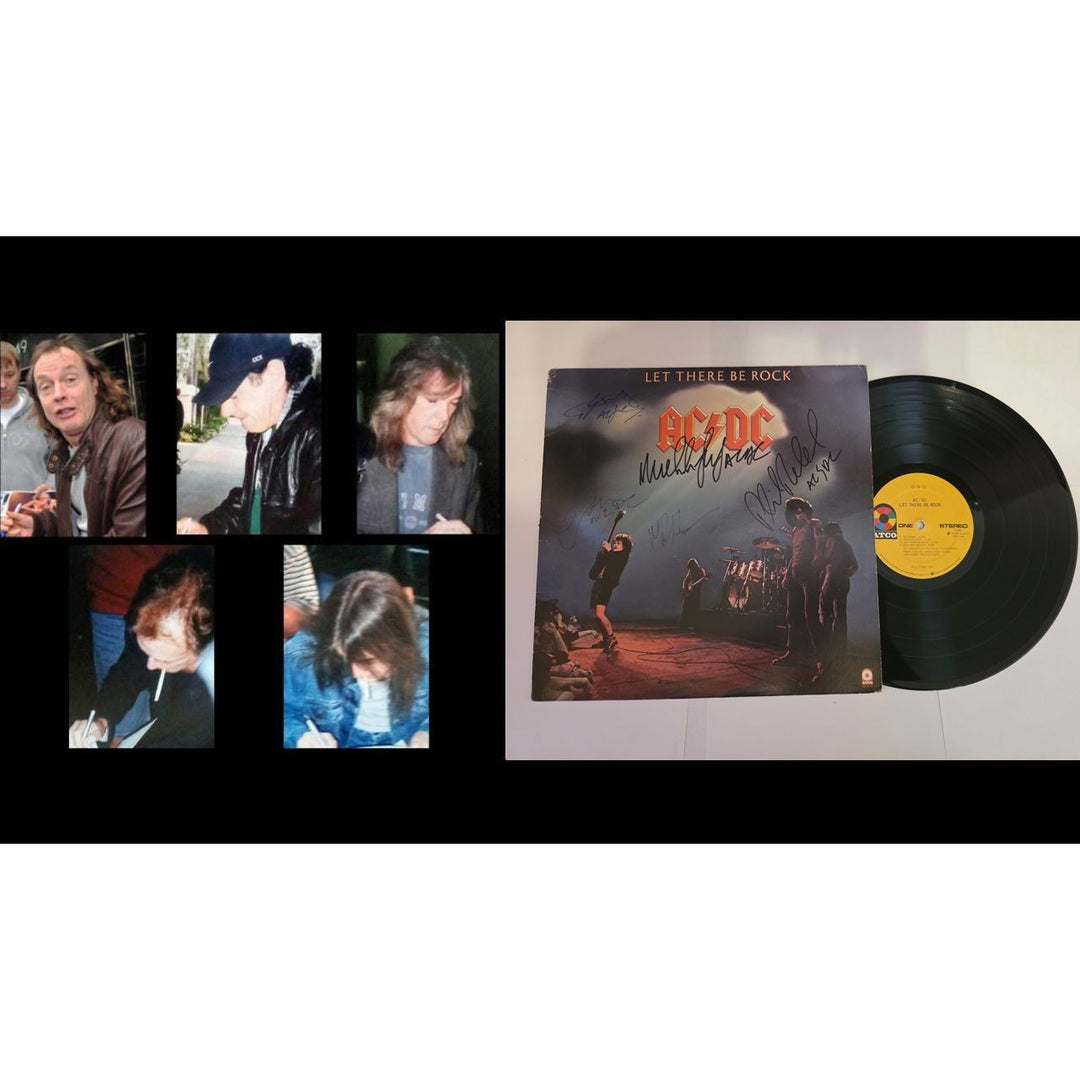 Angus young Malcolm Young Brian Johnson Cliff Williams Phil Rudd AC DC Let there be rock lp signed with proof.