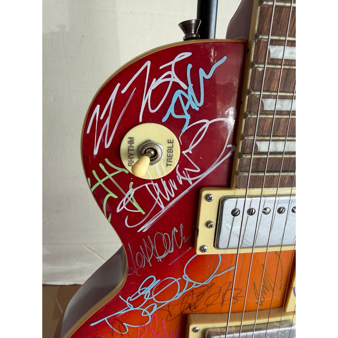 Guitar legends 36 signed in all Angus Young Paul Simon Jimmy Page David Gilmour Les Paul guitar signed with full provenance and photo proof.