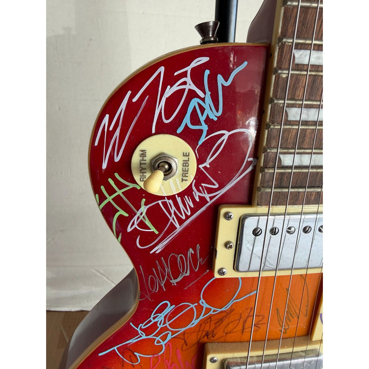 Guitar legends 36 signed in all Angus Young Paul Simon Jimmy Page David Gilmour Les Paul guitar signed with full provenance and photo proof.