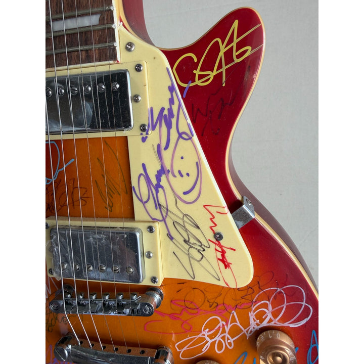 Guitar legends 36 signed in all Angus Young Paul Simon Jimmy Page David Gilmour Les Paul guitar signed with full provenance and photo proof.