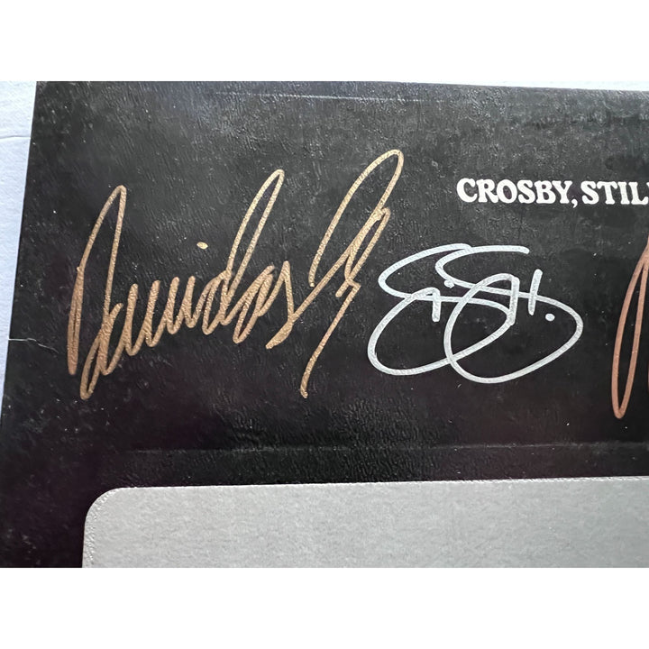 Crosby Stills & Nash and Young, LP signed with proof