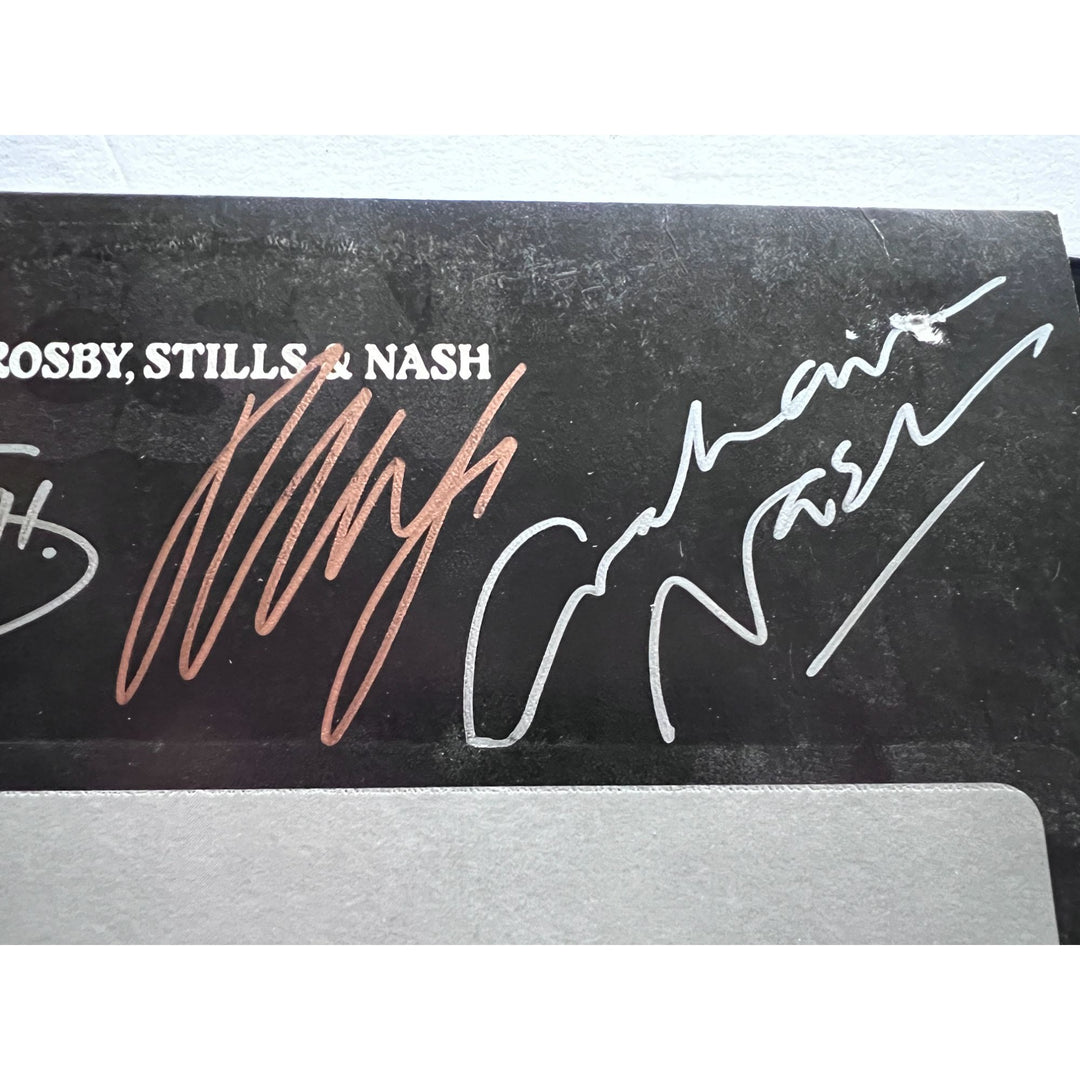 Crosby Stills & Nash and Young, LP signed with proof