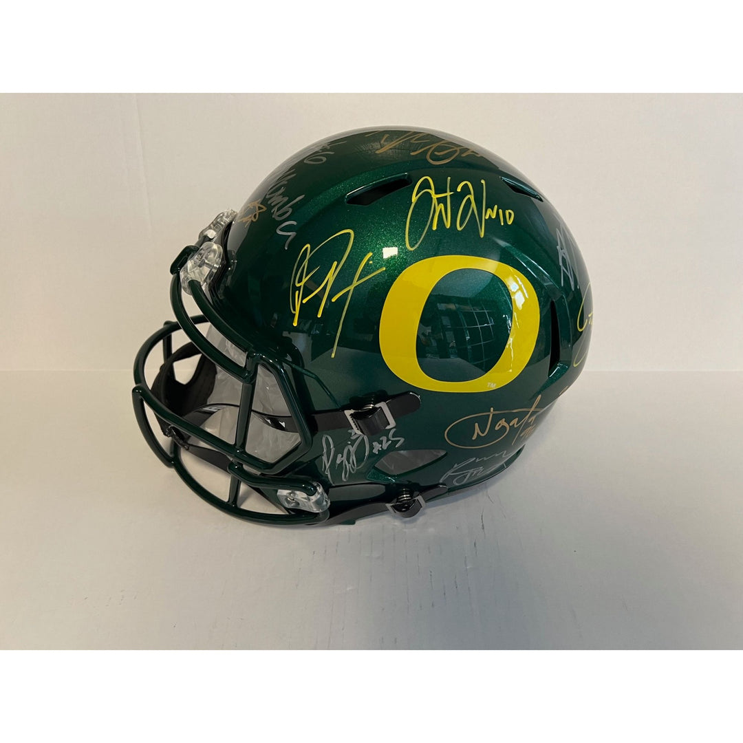 Oregon Ducks Dan Fouts Justin Herbert Bo Nix 20 plus all-time greats signed Riddell full size helmet signed with proof