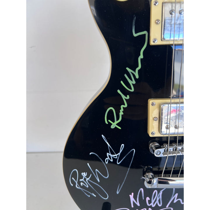Pink Floyd Roger Waters David Gilmour Richard Wright Nick Mason vintage black les paul electric guitar signed with proof.