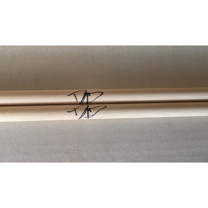 David Grohl Nirvana Foo Fighters drummer signed drumsticks with proof.