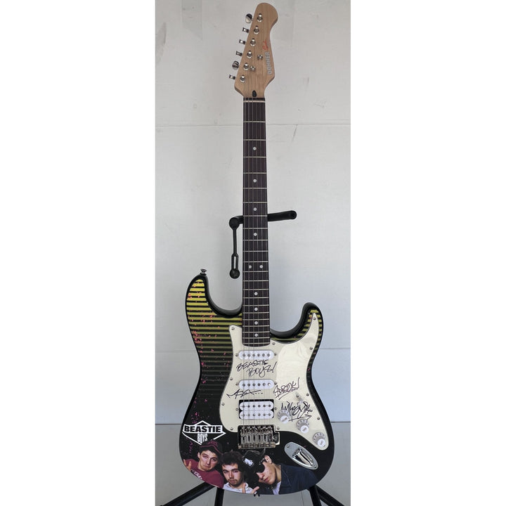 Adam Horowitz ''AD-Rock'', Michael ''Mike D'' Diamond, Adam ''MCA'' Yauch,  the Beastie Boys electric guitar signed with proof.
