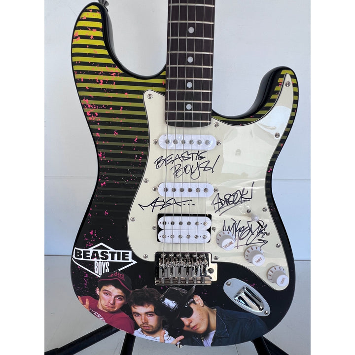 Adam Horowitz ''AD-Rock'', Michael ''Mike D'' Diamond, Adam ''MCA'' Yauch,  the Beastie Boys electric guitar signed with proof.