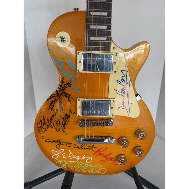 The Eagles Don Henley Glenn Frey Bernie Leadon Timothy B Schmit Joe Walsh Don Felder Randy Meisner Gold Les Paul Guitar signed with proof.