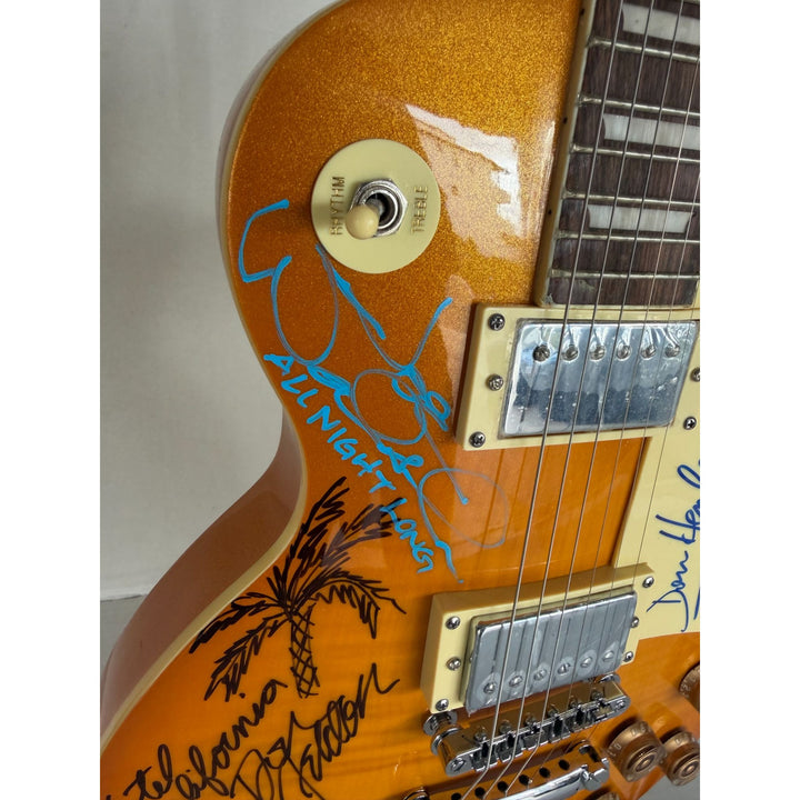 The Eagles Don Henley Glenn Frey Bernie Leadon Timothy B Schmit Joe Walsh Don Felder Randy Meisner Gold Les Paul Guitar signed with proof.