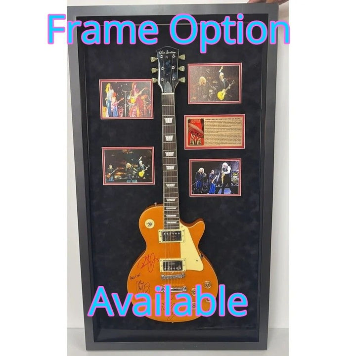 The Eagles Don Henley Glenn Frey Bernie Leadon Timothy B Schmit Joe Walsh Don Felder Randy Meisner Gold Les Paul Guitar signed with proof.