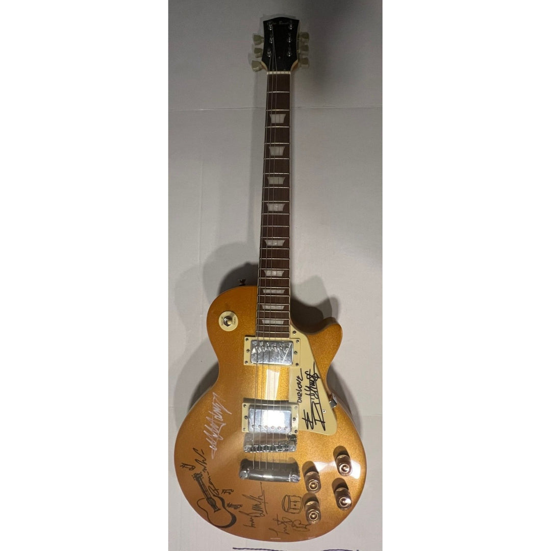 The Rolling Stones Mick Jagger Bill Wyman Mick Taylor Ronnie Wood Keith Richards signed and inscribed one full size Les Paul electric guitar